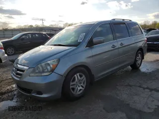 2007 Honda Odyssey EX-L with VIN 5FNRL38777B030285, listed as a Copart auction lot 52752985 with 293,414 mi miles and Salvage Title. Bid and sale history available at carsss.com. Image 1.