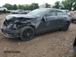 2015 Cadillac ATS Standard AWD with VIN 1G6AG5RX1F0141720, listed as a Copart auction lot 61797225 with 127,134 mi miles and Salvage title. Bid and sale history available at DreamBid. Image 1.