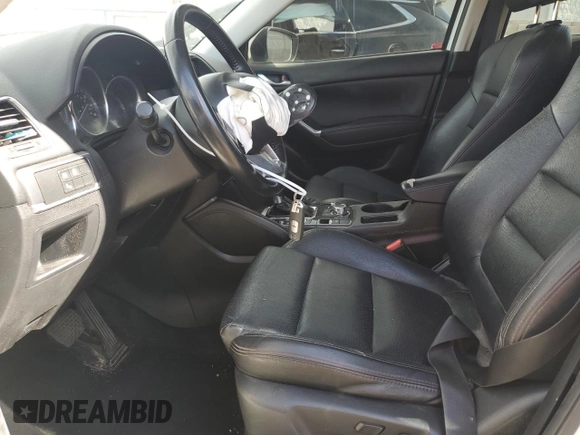 2016 Mazda CX-5 Grand Touring with VIN JM3KE2DY0G0888854, listed as a Copart auction lot 68379754 with 73,096 mi miles and Salvage Title. Bid and sale history available at carsss.com. Image 7.