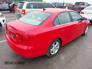 2014 Volkswagen Jetta TDI w/Premium/Nav with VIN 3VWLL7AJ4EM383351, listed as a IAAI auction lot 42424074 with 66,824 mi miles and . Bid and sale history available at DreamBid. Image 4.