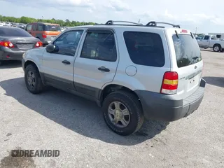 2005 Ford Escape XLS Value with VIN 1FMYU02Z35KD87671, listed as a IAAI auction lot 41880824 with 278,689 mi miles. Bid and sale history available at carsss.com. Image 3.