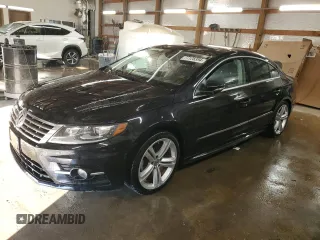 2014 Volkswagen CC R-Line with VIN WVWBN7AN3EE503237, listed as a Copart auction lot 77128394 with 84,995 mi miles and Salvage Title. Bid and sale history available at carsss.com. Image 1.