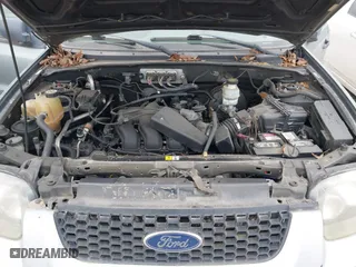 2007 Ford Escape XLT with VIN 1FMYU03157KA67702, listed as a IAAI auction lot 41661243 with 1 mi miles. Bid and sale history available at carsss.com. Image 10.