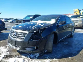 2013 Cadillac XTS Luxury with VIN 2G61P5S33D9101486, listed as a IAAI auction lot 41629349 with 141,050 mi miles. Bid and sale history available at carsss.com. Image 18.