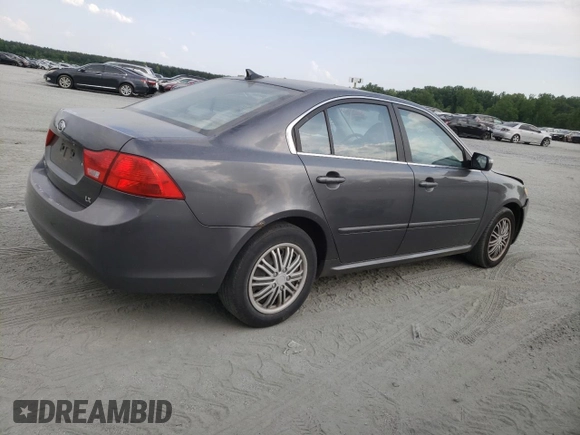 2009 Kia Optima LX z VIN KNAGE228695331919, wystawiony jako Copart lot #57804835 z przebiegiem 199 204 mil mil oraz Szkoda całkowita • Salvage title. Historia ofert i sprzedaży dostępna na DreamBid. Obrazek 3.