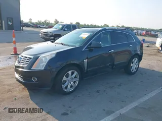 2014 Cadillac SRX Performance Collection with VIN 3GYFNFE35ES663320, listed as a IAAI auction lot 42480235 with 112,406 mi miles and . Bid and sale history available at DreamBid. Image 17.