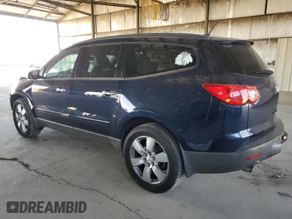 2012 Chevrolet Traverse LTZ z VIN 1GNKRLED9CJ332651, wystawiony jako Copart lot #55253655 z przebiegiem 128 113 mil mil oraz Szkoda całkowita • Salvage title. Historia ofert i sprzedaży dostępna na DreamBid. Obrazek 2.