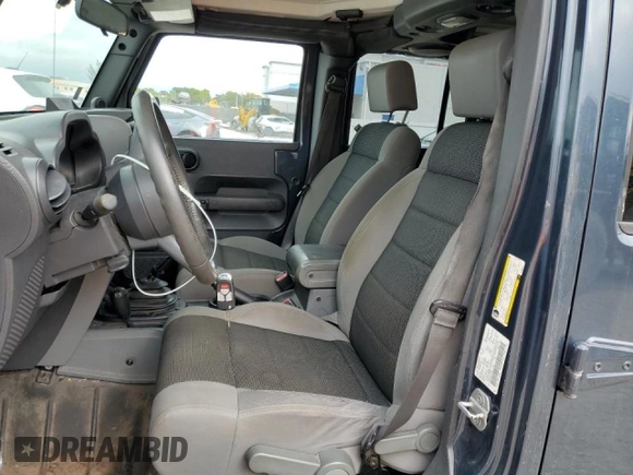 2007 Jeep Wrangler Unlimited X with VIN 1J8GA39107L105101, listed as a Copart auction lot 88559675 with 213,902 mi miles and Salvage title. Bid and sale history available at DreamBid. Image 7.