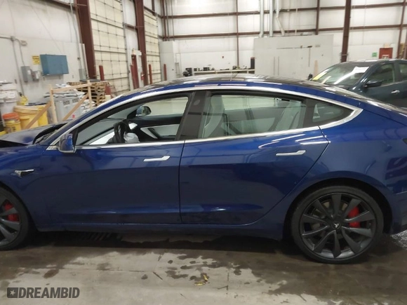 2020 Tesla Model 3 Performance with VIN 5YJ3E1EC7LF641885, listed as a IAAI auction lot 41372794 with NaN miles. Bid and sale history available at carsss.com. Image 13.
