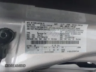 2012 Ford Focus SEL with VIN 1FAHP3H29CL300165, listed as a IAAI auction lot 42137804 with 96,644 mi miles. Bid and sale history available at carsss.com. Image 9.