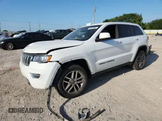 2020 Jeep Grand Cherokee Laredo E with VIN 1C4RJFAG6LC178341, listed as a Copart auction lot 63818985 with 60,665 mi miles and Salvage title. Bid and sale history available at DreamBid. Image 1.