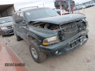 1999 Dodge Durango z VIN 1B4HS28Z6XF658583, wystawiony jako IAAI lot #41698221 z przebiegiem 297 598 mil mil oraz . Historia ofert i sprzedaży dostępna na DreamBid. Obrazek 1.