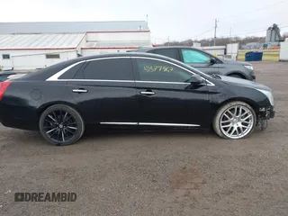 2014 Cadillac XTS Platinum with VIN 2G61W5S84E9291640, listed as a IAAI auction lot 41877867 with 100,462 mi miles and . Bid and sale history available at DreamBid. Image 13.