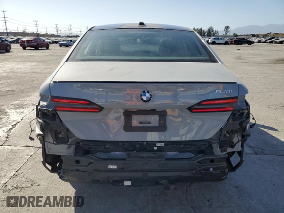 2024 BMW 5 Series 530i with VIN WBA43FJ06RCP67824, listed as a Copart auction lot 61351965 with 12,990 mi miles and Salvage title. Bid and sale history available at DreamBid. Image 6.