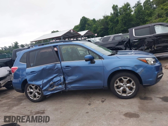2018 Subaru Forester Touring with VIN JF2SJAWC6JH597365, listed as a IAAI auction lot 42606953 with 66,340 mi miles and . Bid and sale history available at DreamBid. Image 13.
