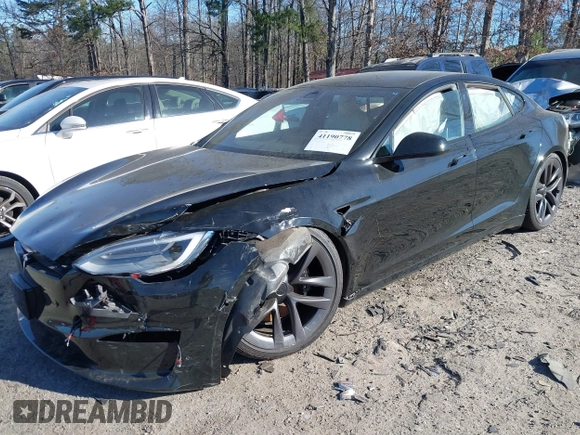 2021 Tesla Model S Long Range z VIN 5YJSA1E50MF438864, wystawiony jako IAAI lot #41190778 z przebiegiem Nie podano mil oraz . Historia ofert i sprzedaży dostępna na DreamBid. Obrazek 22.