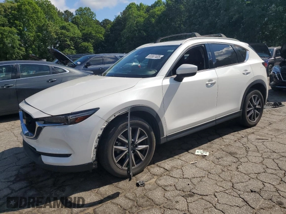 2018 Mazda CX-5 Grand Touring с VIN JM3KFADM3J1351532, выставлен на аукционе Copart как лот 55567405 с пробегом 99 134 миль миль и Списание • Salvage title. История ставок и продаж доступна на DreamBid. Изображение 1.