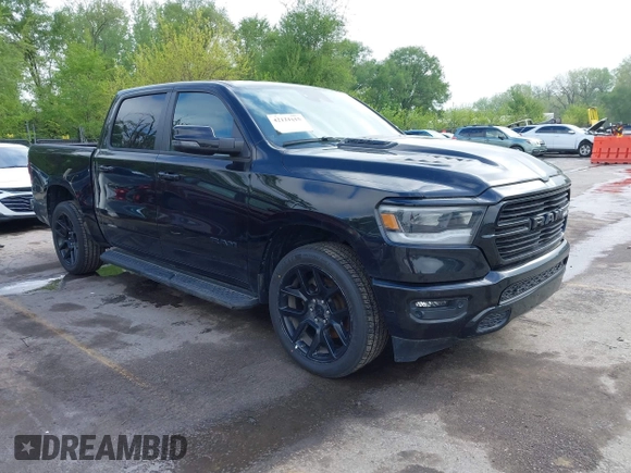 2023 Ram 1500 Laramie with VIN 1C6SRFJTXPN541328, listed as a IAAI auction lot 42121615 with 61,939 mi miles and . Bid and sale history available at DreamBid. Image 1.