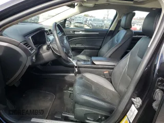 2019 Ford Fusion Hybrid Titanium with VIN 3FA6P0RU0KR144636, listed as a Copart auction lot 44357323 with 100,146 mi miles. Bid and sale history available at carsss.com. Image 7.
