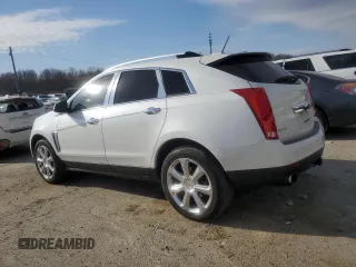2015 Cadillac SRX Premium Collection with VIN 3GYFNDE39FS623425, listed as a Copart auction lot 47740135 with 133,838 mi miles and Salvage title. Bid and sale history available at DreamBid. Image 2.
