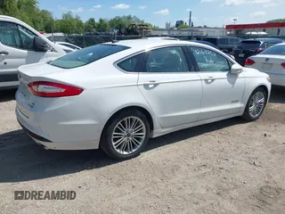 2013 Ford Fusion SE Hybrid with VIN 3FA6P0LU4DR337674, listed as a IAAI auction lot 42164262 with 150,902 mi miles and . Bid and sale history available at carsss.com. Image 4.