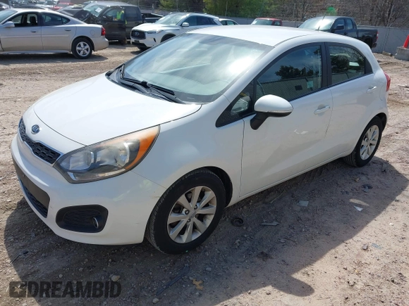 2012 Kia Rio EX with VIN KNADN5A37C6031494, listed as a IAAI auction lot 42052186 with 141,765 mi miles. Bid and sale history available at carsss.com. Image 2.