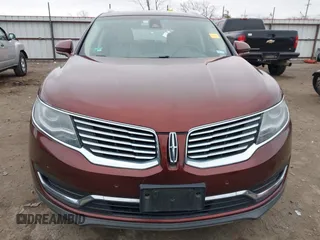 2016 Lincoln MKX Reserve z VIN 2LMPJ6LP0GBL42595, wystawiony jako IAAI lot #41248786 z przebiegiem 99 895 mil mil oraz . Historia ofert i sprzedaży dostępna na DreamBid. Obrazek 13.