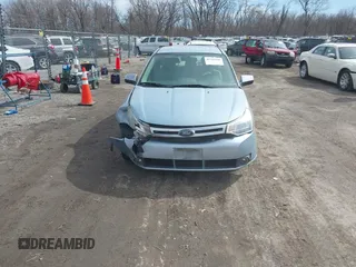 2009 Ford Focus SEL with VIN 1FAHP37N59W164619, listed as a IAAI auction lot 41762640 with 147,643 mi miles. Bid and sale history available at carsss.com. Image 12.