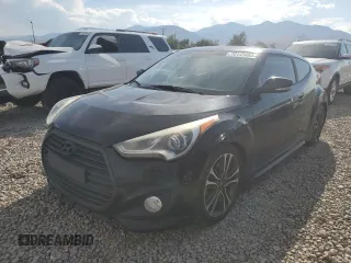 2016 Hyundai Veloster Turbo z VIN KMHTC6AE6GU291118, wystawiony jako Copart lot #70143484 z przebiegiem 124 387 mil mil oraz Szkoda całkowita • Salvage title. Historia ofert i sprzedaży dostępna na DreamBid. Obrazek 1.