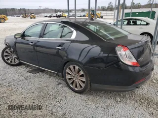 2014 Lincoln MKS EcoBoost z VIN 1LNHL9FT5EG601141, wystawiony jako Copart lot #86497854 z przebiegiem 136 915 mil mil oraz Szkoda całkowita • Salvage title. Historia ofert i sprzedaży dostępna na DreamBid. Obrazek 2.
