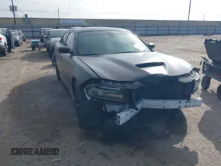 2021 Dodge Charger GT with VIN 2C3CDXHGXMH648429, listed as a IAAI auction lot 41476622 with 31,648 mi miles and . Bid and sale history available at DreamBid. Image 1.