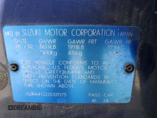 2002 Suzuki Aerio S z VIN JS2RA41S225109275, wystawiony jako Copart lot #52689585 z przebiegiem 195 612 mil mil oraz Tytuł czysty. Historia ofert i sprzedaży dostępna na DreamBid. Obrazek 14.