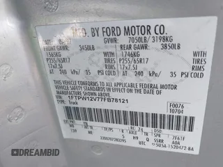 2007 Ford F-150 XLT with VIN 1FTPW12V77FB78121, listed as a IAAI auction lot 42300080 with 203,990 mi miles and . Bid and sale history available at DreamBid. Image 9.