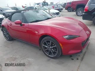 2016 Mazda MX-5 Miata Grand Touring z VIN JM1NDAD74G0109949, wystawiony jako IAAI lot #42091798 z przebiegiem 122 411 mil mil oraz . Historia ofert i sprzedaży dostępna na DreamBid. Obrazek 1.
