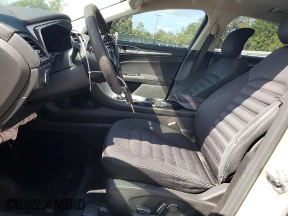 2015 Ford Fusion SE Hybrid z VIN 3FA6P0LU7FR102723, wystawiony jako Copart lot #62334345 z przebiegiem 136 341 mil mil oraz Nie do naprawy • Non repairable. Historia ofert i sprzedaży dostępna na DreamBid. Obrazek 7.