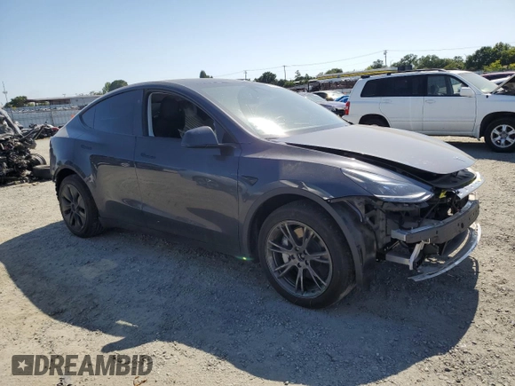 2024 Tesla Model Y Long Range z VIN 7SAYGAEE0RF101971, wystawiony jako Copart lot #58794335 z przebiegiem 16 099 mil mil oraz Szkoda całkowita • Salvage title. Historia ofert i sprzedaży dostępna na DreamBid. Obrazek 4.