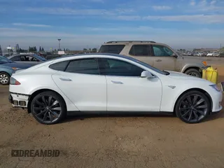 2012 Tesla Model S Performance with VIN 5YJSA1DP7CFS01032, listed as a IAAI auction lot 41423925 with 18,070 mi miles. Bid and sale history available at carsss.com. Image 13.