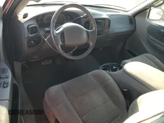 2002 Ford F-150 XL with VIN 1FTRX18L82NA54692, listed as a Copart auction lot 62559605 with 216,350 mi miles and Salvage title. Bid and sale history available at DreamBid. Image 8.
