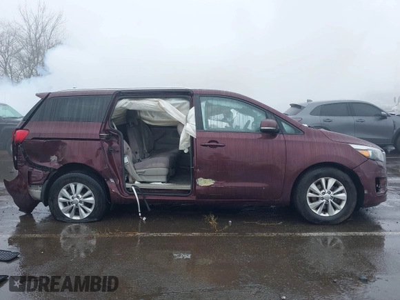 2016 Kia Sedona LX with VIN KNDMB5C17G6144987, listed as a IAAI auction lot 41569757 with 164,539 mi miles. Bid and sale history available at carsss.com. Image 13.