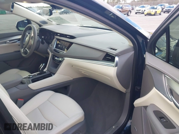 2024 Cadillac XT5 FWD Premium Luxury with VIN 1GYKNCR45RZ733939, listed as a IAAI auction lot 41224515 with 6,945 mi miles. Bid and sale history available at carsss.com. Image 5.
