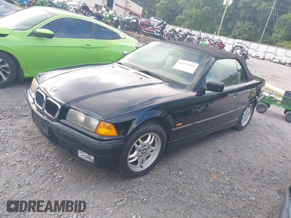 1999 BMW 3 Series 323i with VIN WBABJ8330XEM23911, listed as a IAAI auction lot 42523948 with 125,371 mi miles and . Bid and sale history available at DreamBid. Image 2.