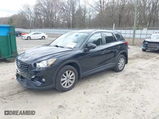 2016 Mazda CX-5 Touring with VIN JM3KE4CY1G0829079, listed as a IAAI auction lot 41844367 with 67,349 mi miles. Bid and sale history available at carsss.com. Image 17.