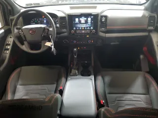 2024 Nissan Frontier SV with VIN 1N6ED1EK4RN620101, listed as a Copart auction lot 61064595 with 11,929 mi miles and Salvage title. Bid and sale history available at DreamBid. Image 8.