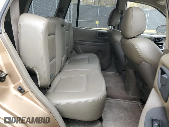 2001 Hyundai Santa Fe GLS with VIN KM8SC83D71U084837, listed as a Copart auction lot 77588984 with 102,585 mi miles and Salvage Title. Bid and sale history available at carsss.com. Image 11.