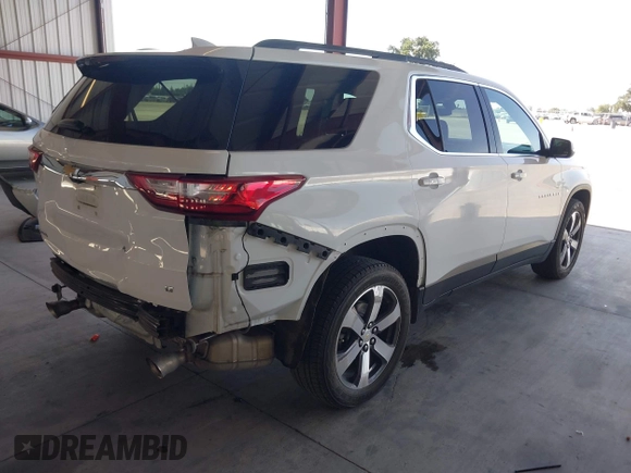 2021 Chevrolet Traverse LT with VIN 1GNERHKW8MJ232171, listed as a IAAI auction lot 42269142 with 88,830 mi miles and . Bid and sale history available at DreamBid. Image 4.