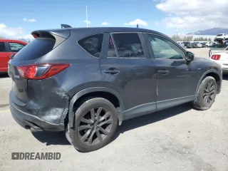 2015 Mazda CX-5 Grand Touring with VIN JM3KE4DY9F0536771, listed as a Copart auction lot 51801775 with 88,529 mi miles and Salvage Title. Bid and sale history available at DreamBid. Image 3.