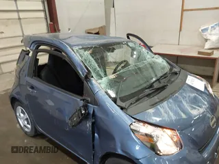 2012 Scion iQ with VIN JTNJJXB01CJ010943, listed as a IAAI auction lot 41742923 with 1 mi miles. Bid and sale history available at carsss.com. Image 14.