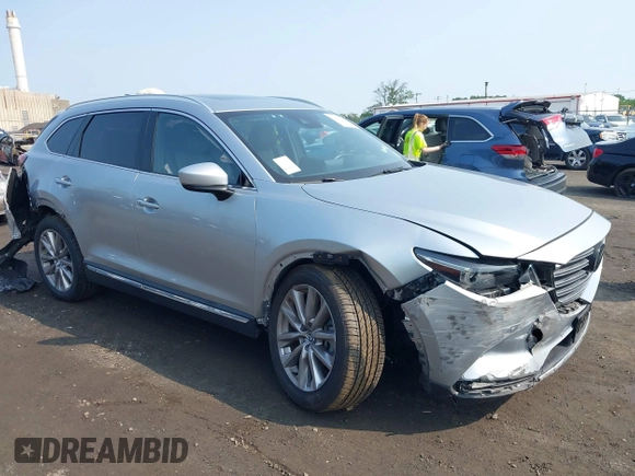 2020 Mazda CX-9 Grand Touring with VIN JM3TCBDY6L0424584, listed as a IAAI auction lot 42473920 with 32,385 mi miles and . Bid and sale history available at DreamBid. Image 1.