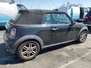 2015 MINI Convertible with VIN WMWZN3C56FT266838, listed as a Copart auction lot 50250745 with 60,331 mi miles and Salvage title. Bid and sale history available at DreamBid. Image 3.