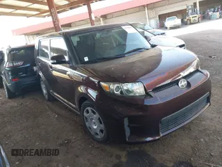 2012 Scion xB with VIN JTLZE4FEXC1144290, listed as a IAAI auction lot 41740866 with 1 mi miles. Bid and sale history available at carsss.com. Image 1.